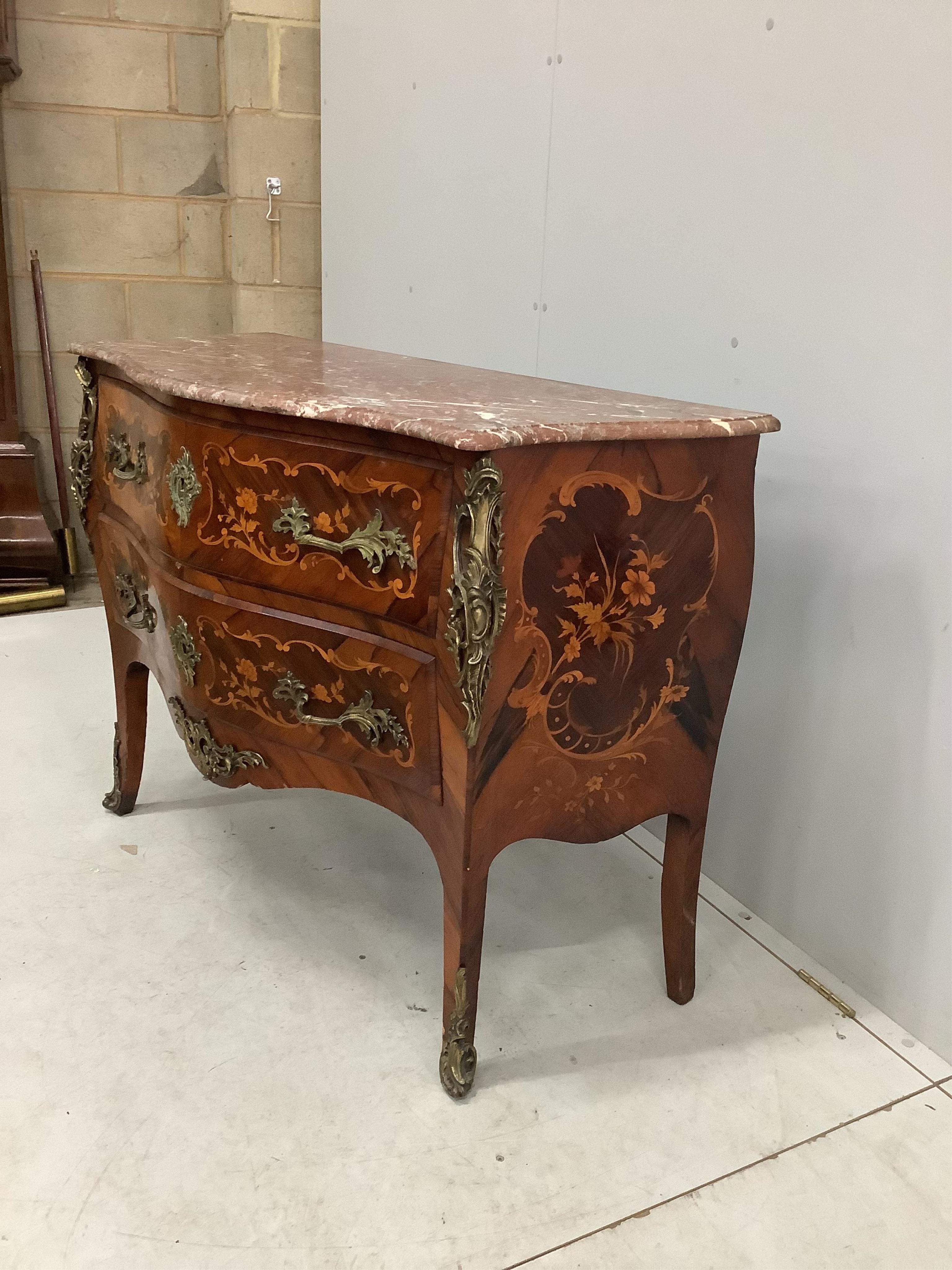 A French gilt metal mounted and marquetry inlaid kingwood marble topped serpentine commode, width 116cm, depth 51cm, height 85cm. Condition - fair to good